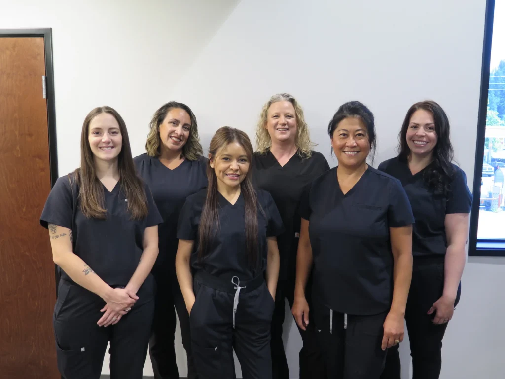 Springfield Dental Hygienists taking a group photo in McKenzie Dental Center upstairs lobby.