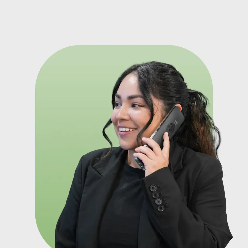 Ari on a phone with a green background
