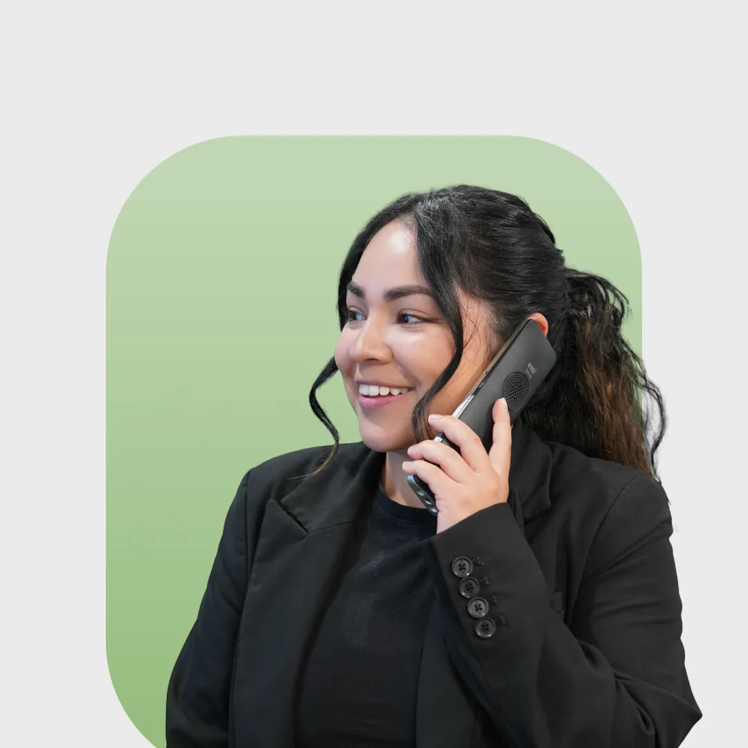 Ari on a phone with a green background